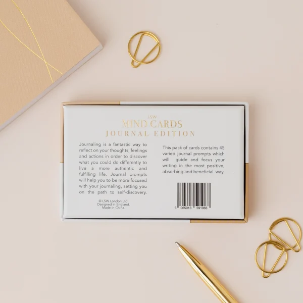 Back of the Mind Cards: Journal Edition box beside a notebook and gold pen