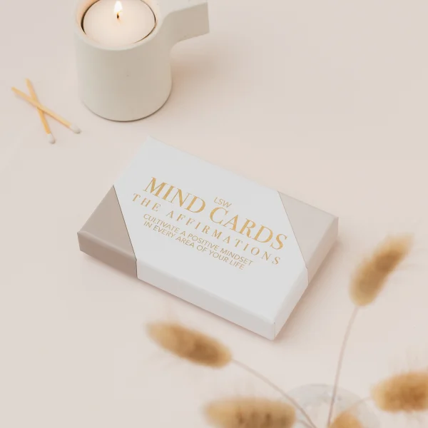 Mind Cards: The Affirmations box beside a lit candle